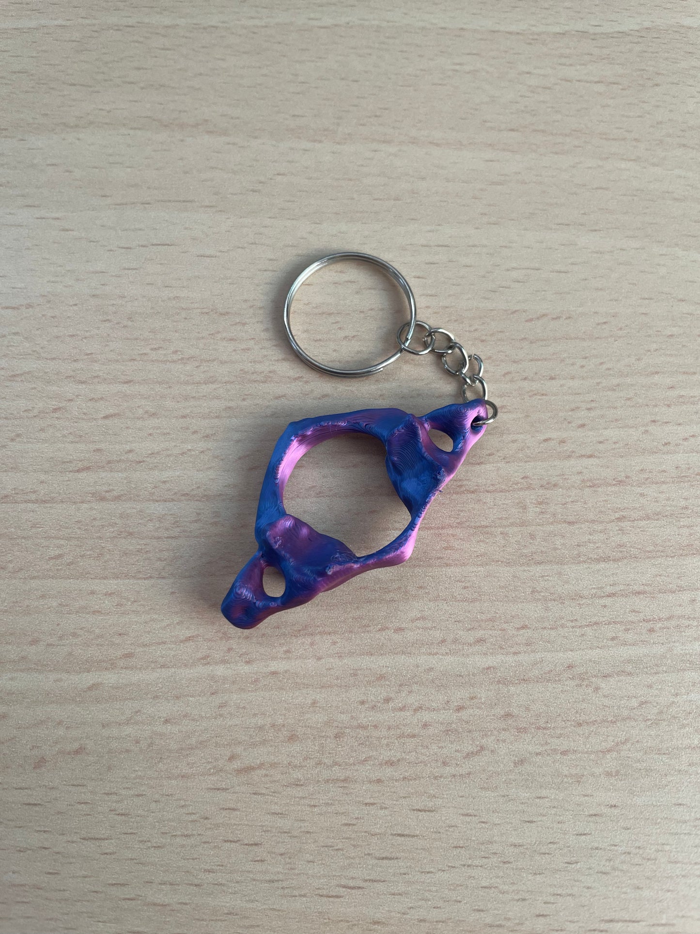 Keychain with a purple and blue colors
